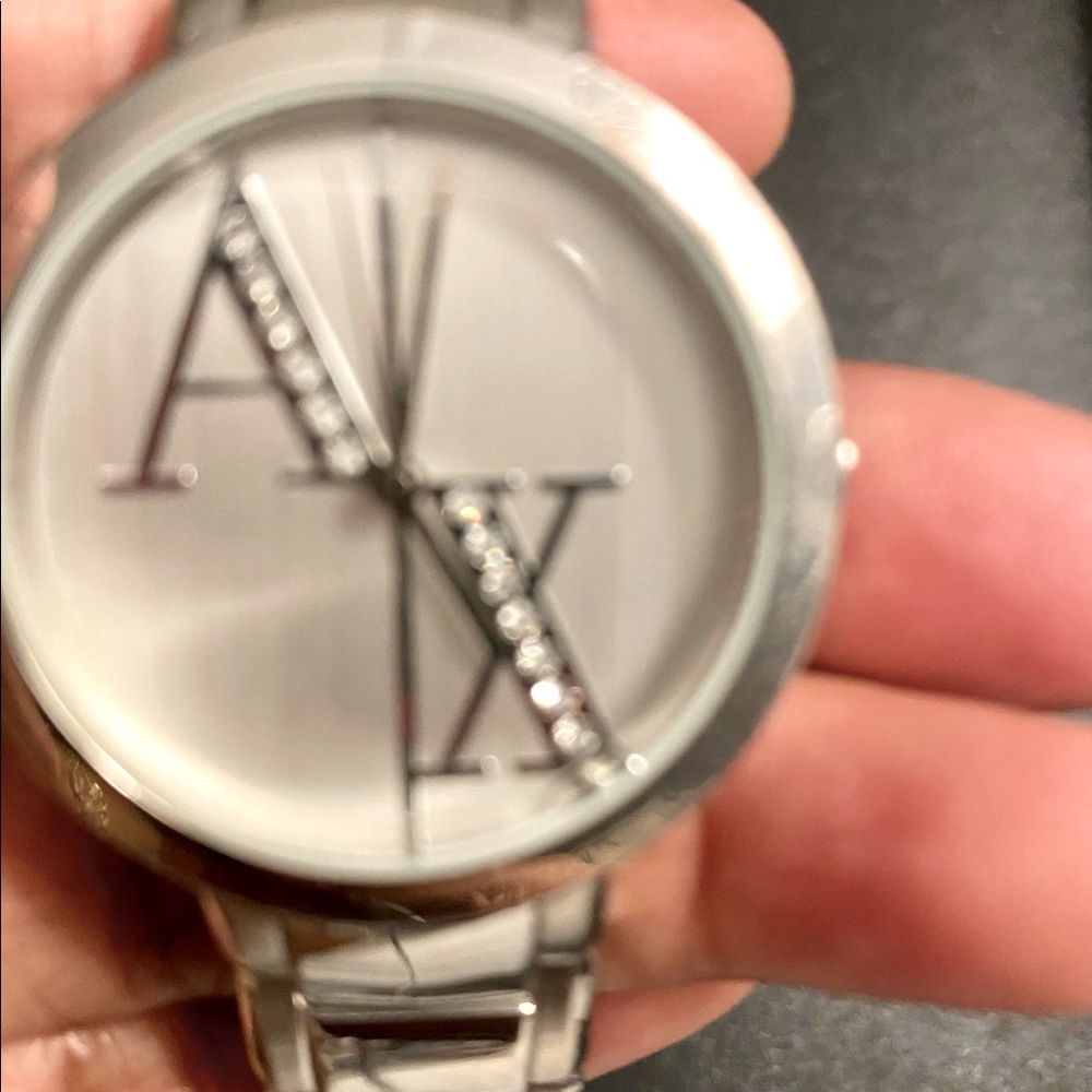 AIX Armani Exchange  Stainless Steel Bracelet Watch. Preowned with scratches